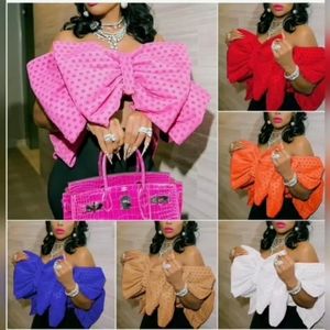 Women's bow top's